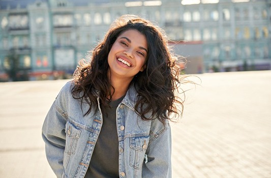 Lady smiles in parking lot