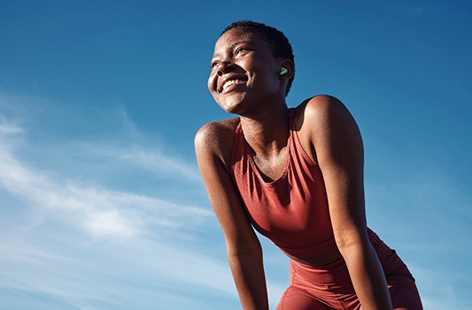 Lady smiles outdoors