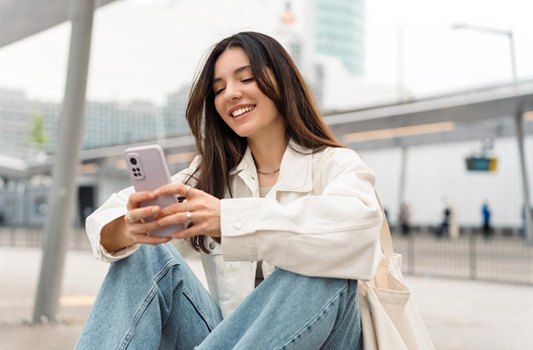 Lady reads something on phone