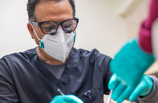 Doctor Vaziri treating a dental patient