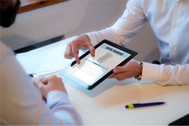 An insurance agent explaining dental insurance to a patient