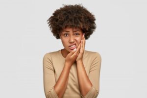 Woman experiencing a toothache